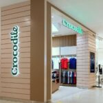 Crocodile International brand retail store showcasing clothing collection in a modern fashion outlet”